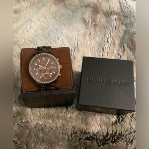 Michael Kors Tortoise Watch. Comes in original box, needs a new battery.